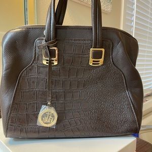 Tag says It Bag Collection! Never been used